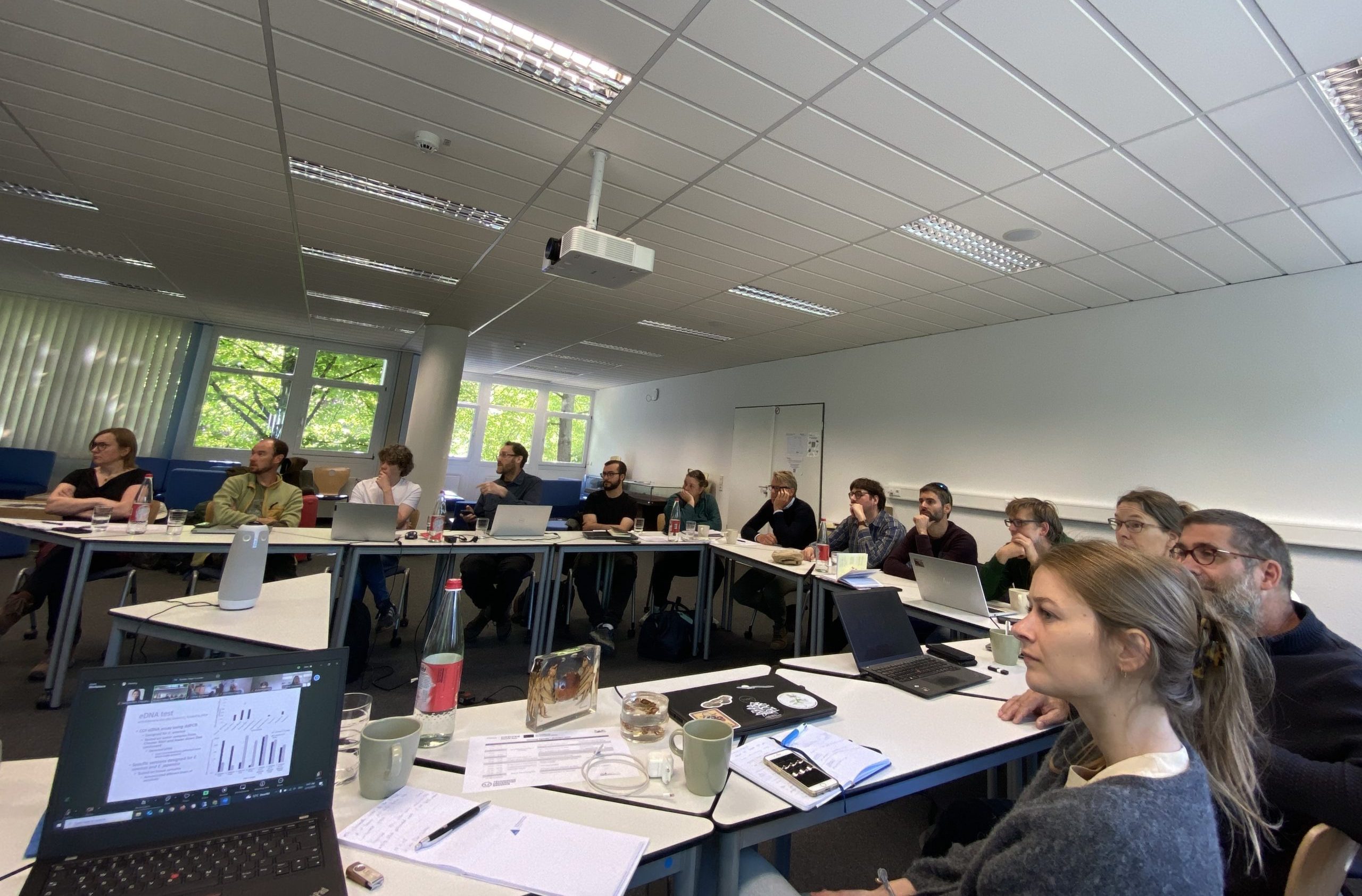 Dr Joe Ironside presenting his research to the meeting