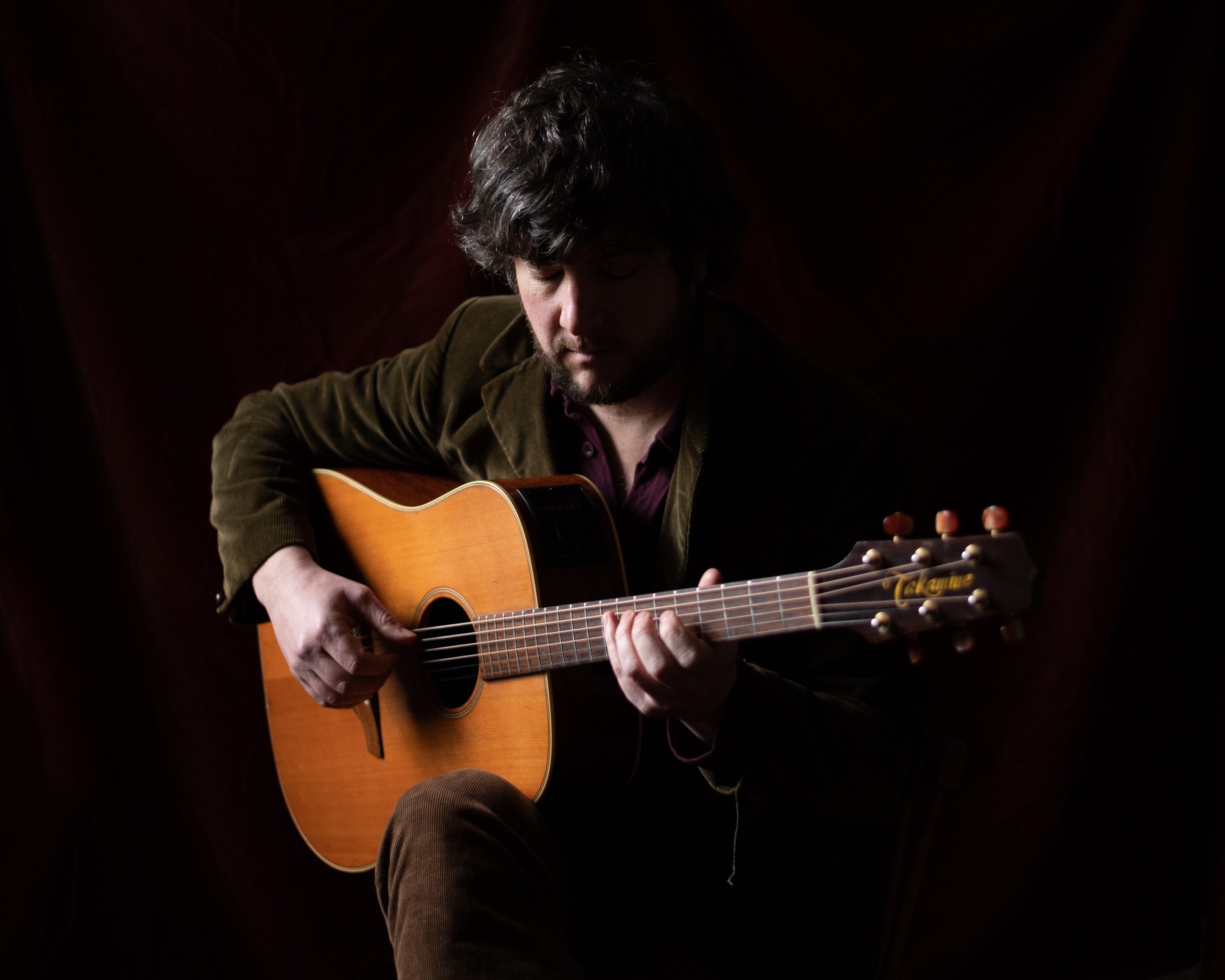 Gareth Bonello / The Gentle Good singer playing guitar